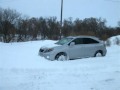 2010 Lexus RX450h AWD in Snow