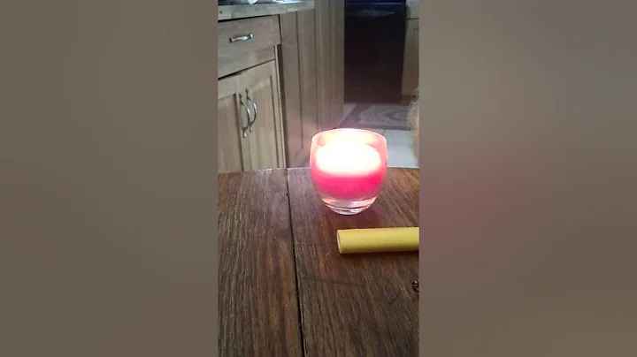 Husband trying to light candle though smoke