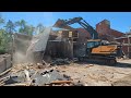 Excavator demolition of a dangerous 66 year old fertilizer shed