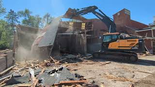 Excavator Demolition Of A Dangerous 66 Year old Fertilizer Shed!