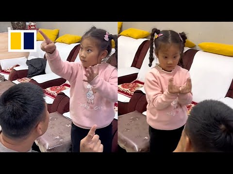 Little girl helps out as translator in deaf parents’ foot spa shop