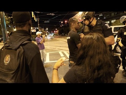 A protester in Charlotte gave out free hugs to police in riot gear — and they were incredibly grateful