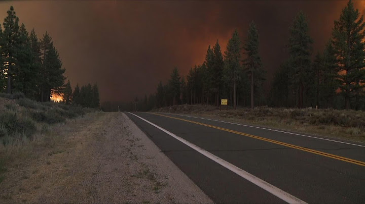 California firefighters battle fast-moving blazes