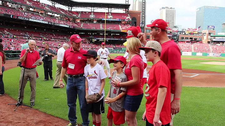Ron Daugherty and Matteo Throw Out the First Pitch...