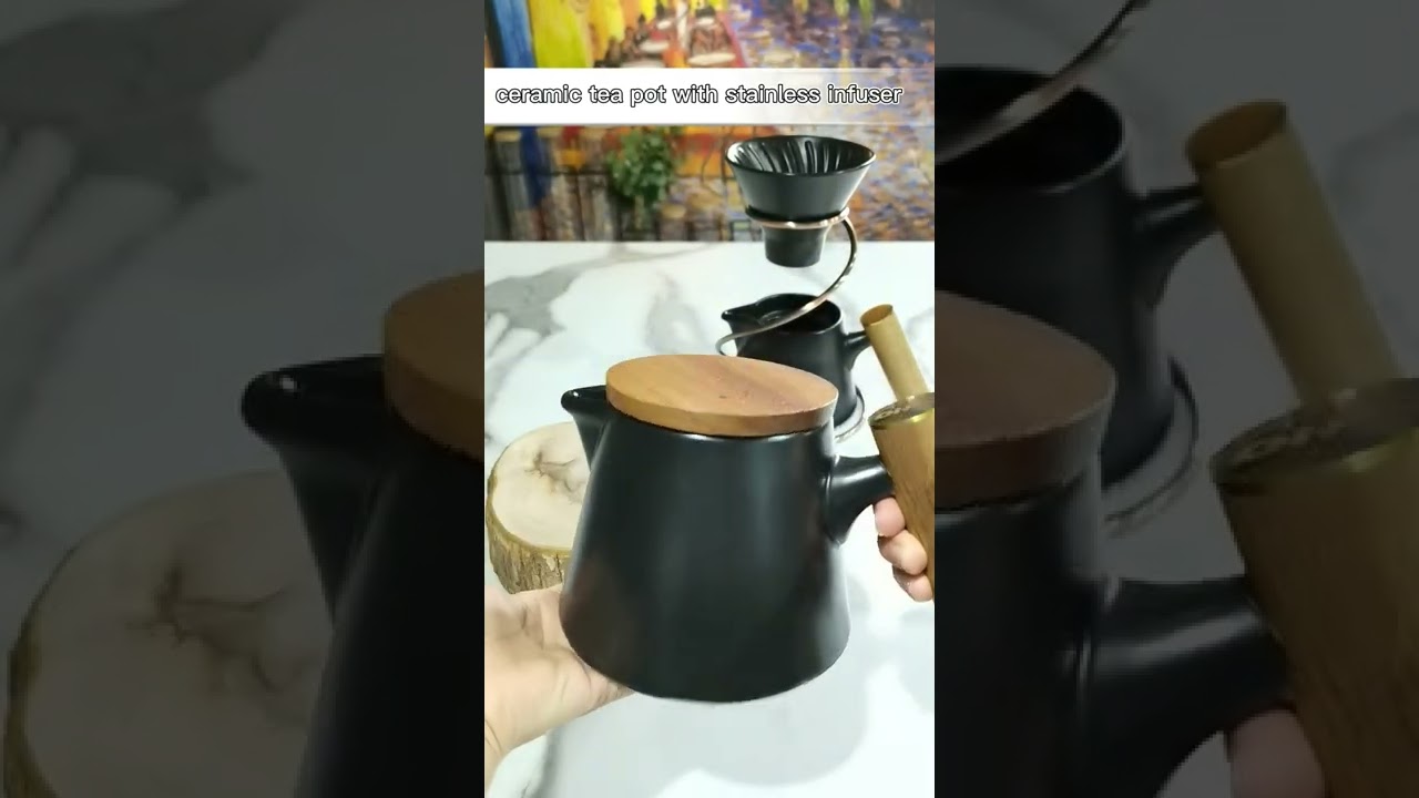 CERAMIC TEAPOT WITH STRAINER AND WOODEN HANDLE