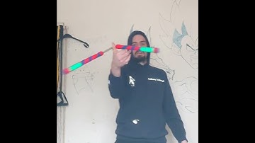 nunchaku slow motion digit spins. horizontal figure 8 thumb spin. #nunchakufreestyle #shorts