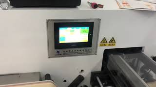 Slitting machine with knife auto setup