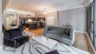 A 1-bedroom, 1 ½ bath Streeterville loft steps from the beach at Axis