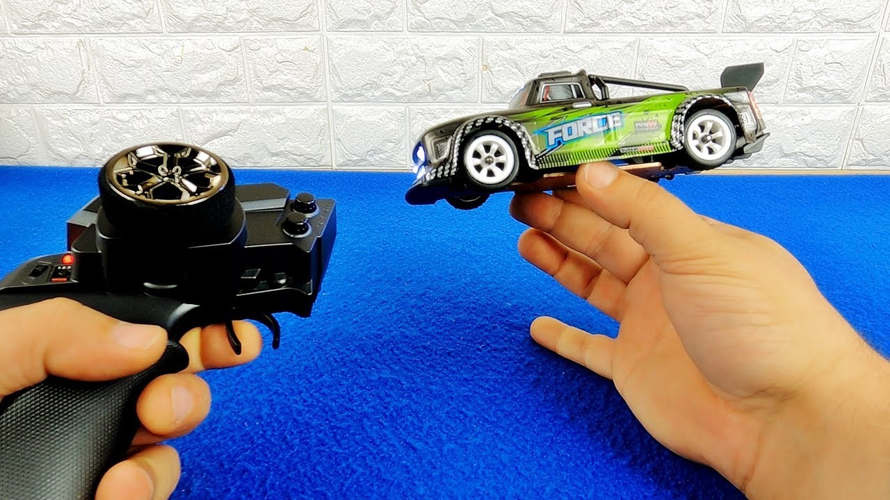 WL TOYS 284131 1/28 MINI RC TRUCK REVIEW: A SURPRISINGLY CAPABLE MICRO  INFRACTION 