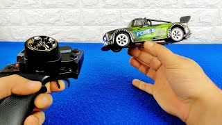 UNBOXING & LETS PLAY! 1:28 MINI DRIFT PORSCHE 911 RC CAR! - WLtoys -  World's Smallest Drift Car? - 