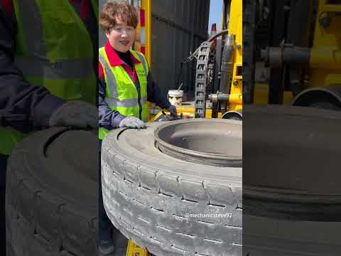 Hard work lady replacement tire.