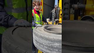 Hard work lady replacement tire.