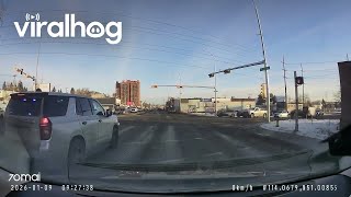 Apparent Red Light Runner Meets Conveniently-Placed Cop Viralhog