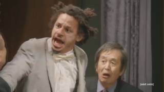 Eric smacks himself in the head with a prosthetic penis and stops a quarrel between two businessmen