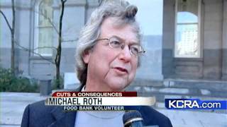 Dozens Protest Proposed Budget Cuts