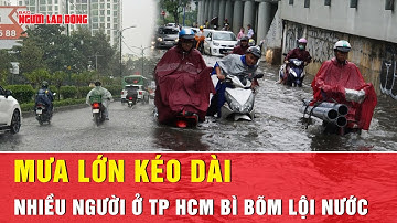 TP HCM mưa lớn kéo dài, nhiều nơi ngập sâu, người dân bì bõm giữa dòng nước | Tin tức
