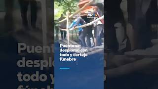 A bridge collapses during a funeral and the coffin ends up in the river A bridge collapses during a funeral and the coffin ends up in the river