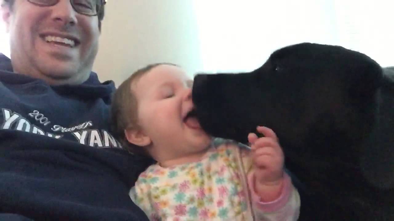 Baby loves her puppy