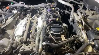 Maserati oil pressure switch being replaced.
