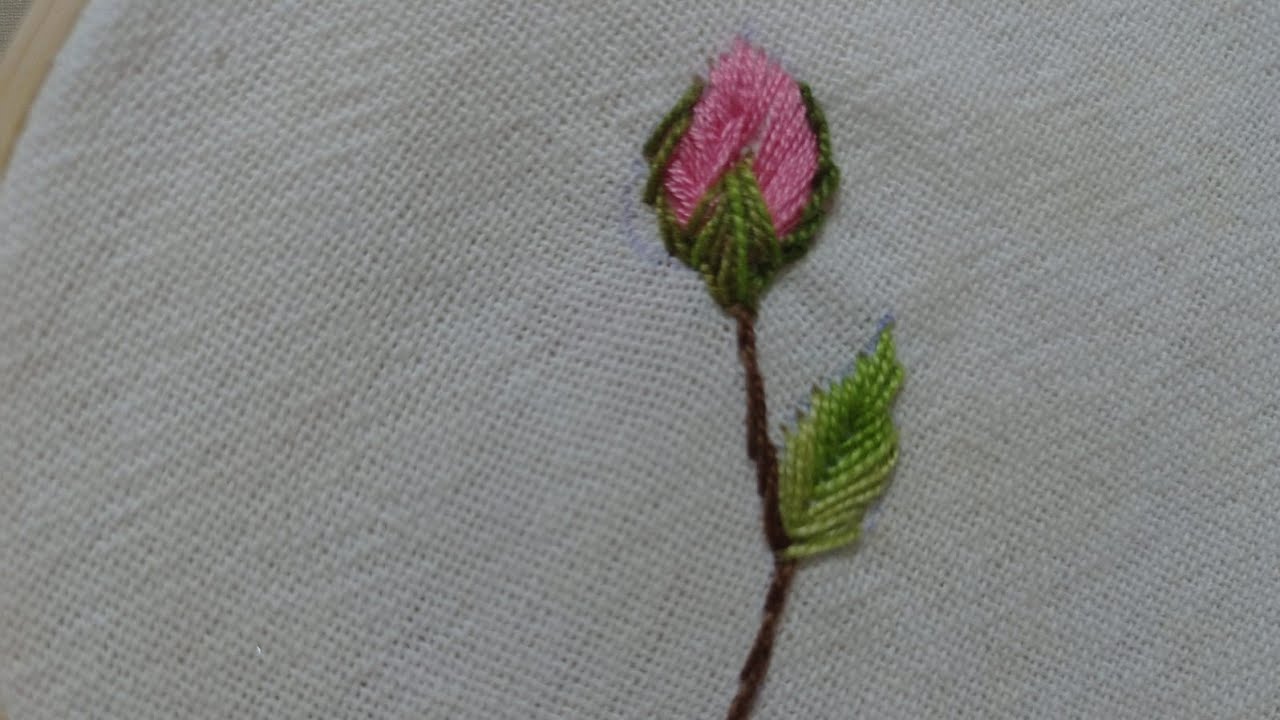 Botão de rosa simples, bordado livre.