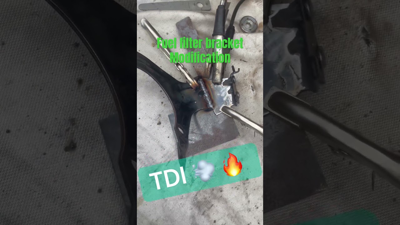 Volvo 850 TDI daily drive project, modified fuel filter bracket. 