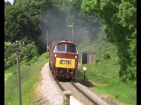 Another film of the successfull West Somerset Railway's Mixed Traction Weekend, this time a bonus! During Sunday 13th June the third and final day of the gala, the sceduled timetable had a range of services being double-headed. This gave me the opportunity to capture the full glory of Diesel Hydraulics working in pairs as havn't been done before in many years. In this film captures all the four types of the hydraulic fleet working in pairs during the gala on various spots over the 20 mile branch. However the shots of D9520 & D9526 at Nethercott were taken on seperate days between the 12th and the 13th, so not to be confused. Diesels covered in this film: - Class 35 Hymek D7017 double heading with BR WR Large Prarie 4160 - Class 14's D9520 & D9526 double heading - Class 52's D1010 'Western Campaigner' & D1062 'Western Courier' double heading - Class 42 D821 'Greyhound' double heading with Class 35 Hymek D7017 Please note: all lineside spots were taken by permission of the WSR as I own a linesiders pass.