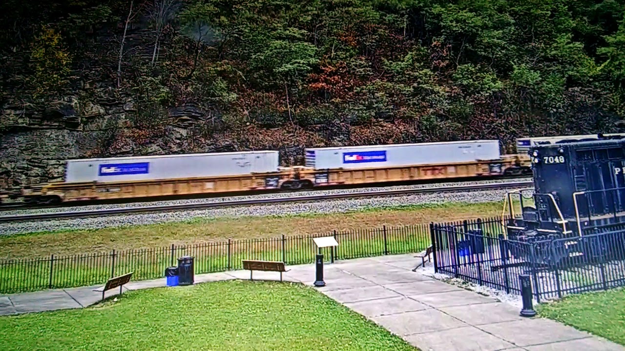 Crex citirail engine trailiing on a intermodal train at the horseshoe ...