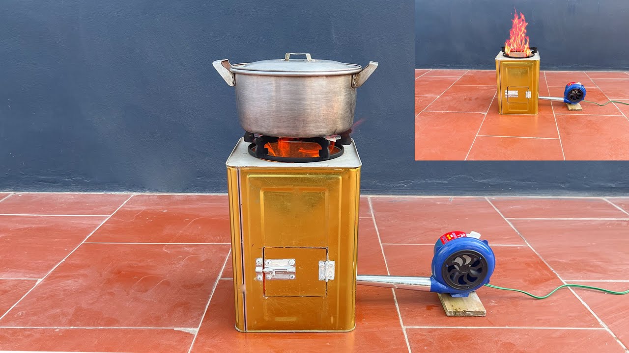 How to make a wood stove with fan from an iron barrel and cement