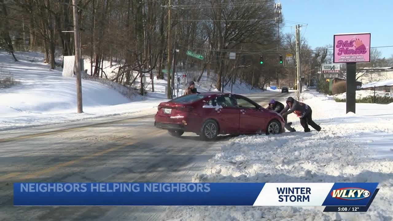 Neighbors helping each other out after snow storm in Louisville