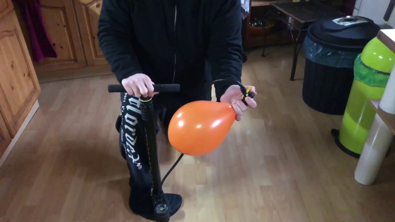 How to inflate a balloon with an air pump pumping up a party balloon