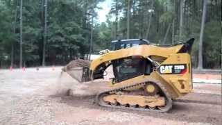 Caterpillar 299D CTL Grading Parking Lot