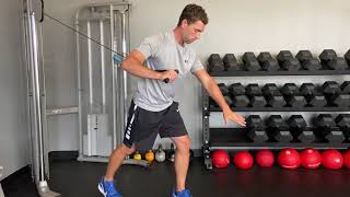 Split stance single arm cable press