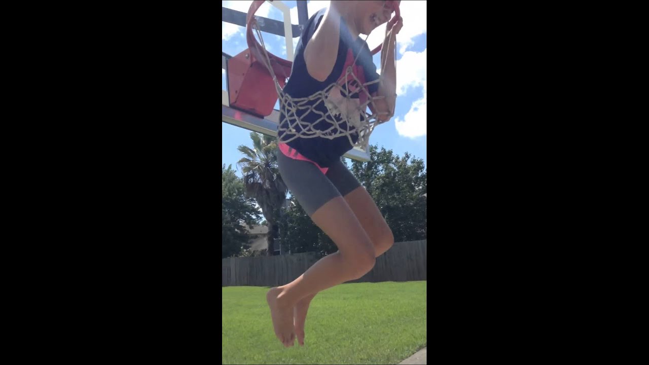 She stuck in the basket ball hoop YouTube