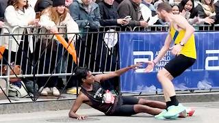 Boston Marathon Runners Praised for Stopping to Help Injured Competitor Cross Finish Line