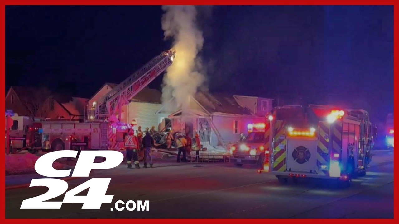 Fire crews battle flames at Oshawa home - YouTube