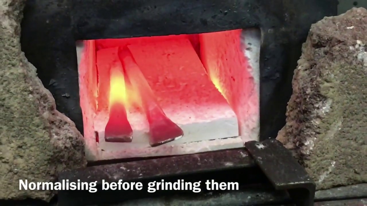 Blacksmithing a chisel and small fuller from coil springs YouTube