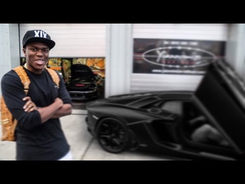 ksi-lamborghini-aventador-wrapped-satin-black-with-tron-lines