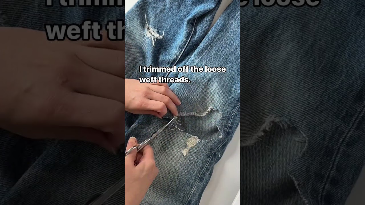 Visible Mending using the back of a denim scrap 