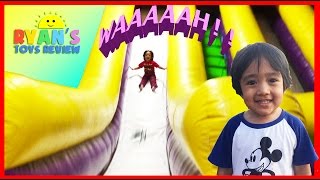 Ryan plays on HUGE Indoor playground GIANT INFLATABLE SLIDES