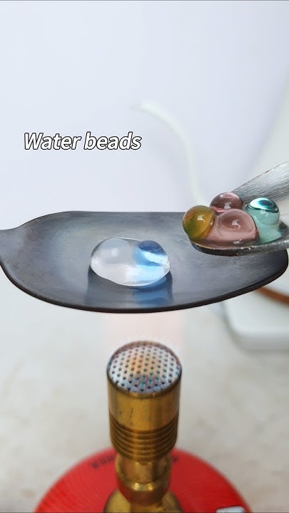 Water beads Vs Hot Spoon #experement #satisfying #shorts - YouTube
