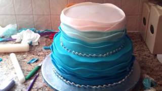 Wave cake with boat on top