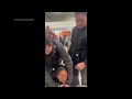 Video shows federal officers arresting crying woman at San Francisco airport
