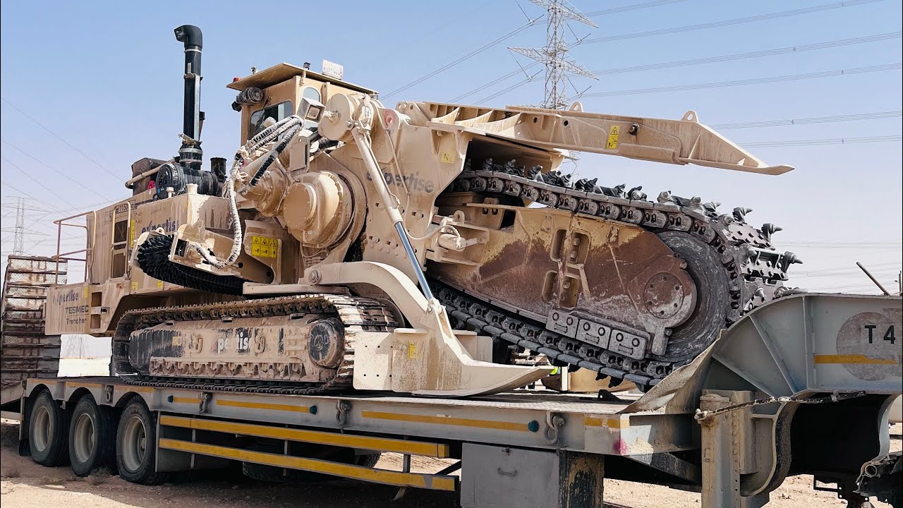 3 Axal lowbed loading in 1150evo trencher 