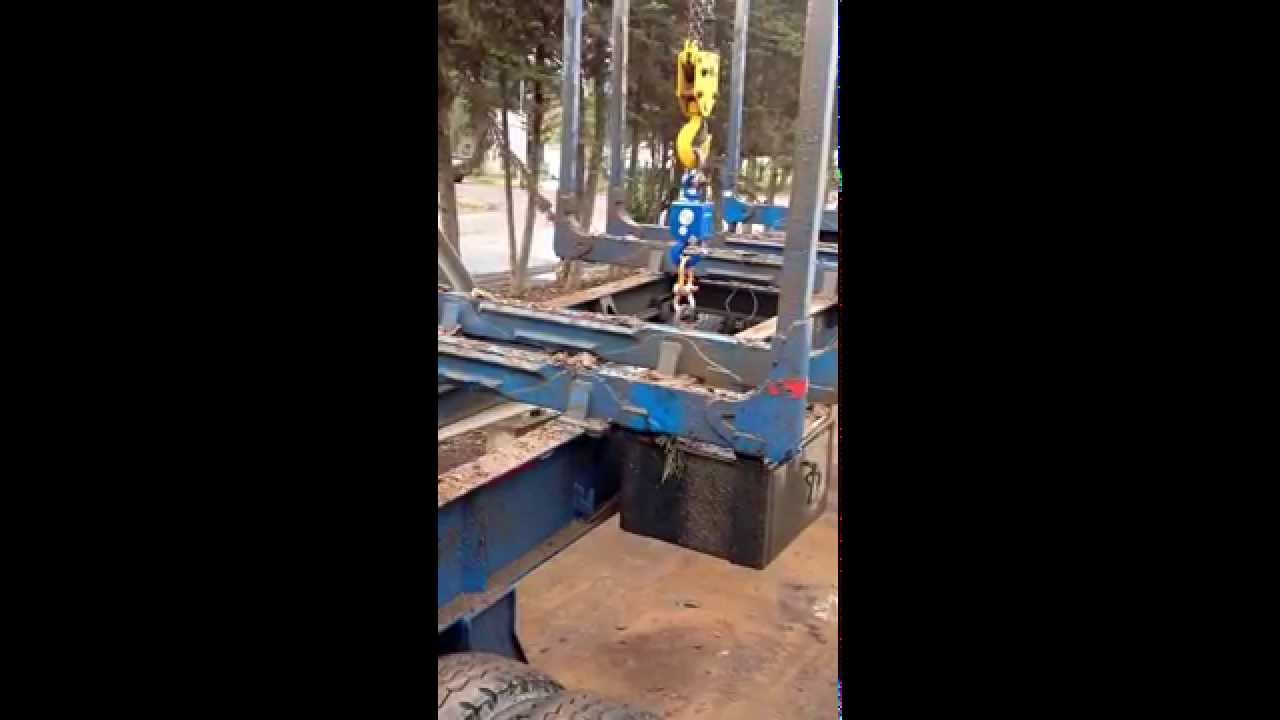 Gancho automático Elebia en forestal Celco (Arauco), operación con carros forestales