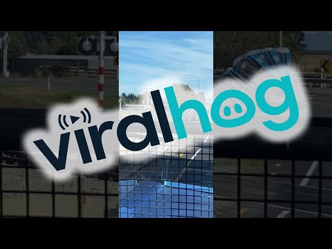 Portable Toilets Spill off Trailer || ViralHog