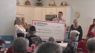 Panama City Beach Senior Center receives check to purchase AED