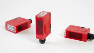 Detection of bottles with a dynamic reference probe and increased range - DRT25C.R Unit pack sensor