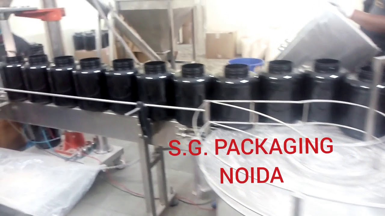 AUGER FILLER MACHINE WITH ONLINE FILLING SYSTEM.