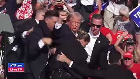 Full video of trump injured but safe after rally shooting.