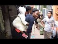 Why do Nigerians carry babies on their backs?